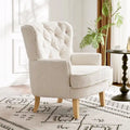 Poltrona Club "Almond Boucle" con borchie