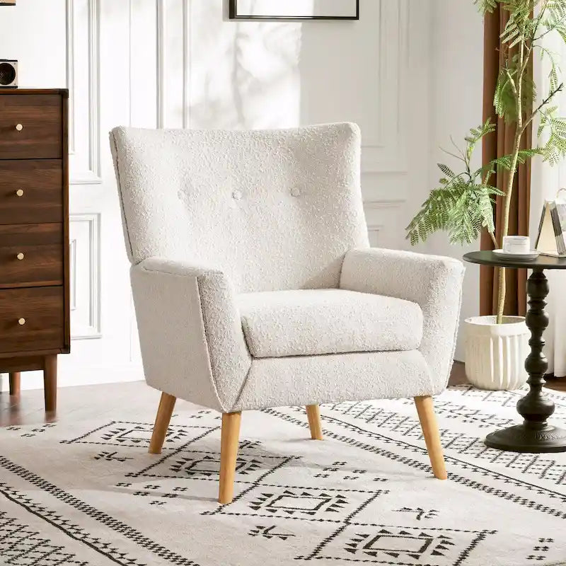 Poltrona moderna in tessuto felpato con gambe in legno