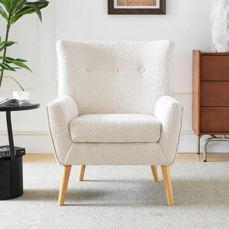Poltrona moderna in tessuto felpato con gambe in legno