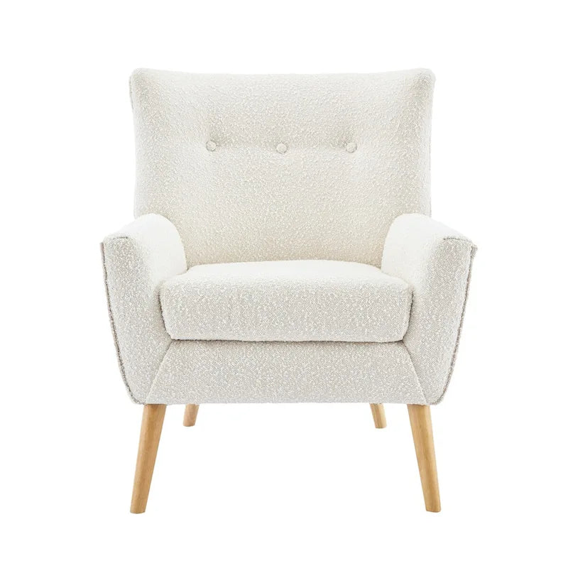 Poltrona moderna in tessuto felpato con gambe in legno