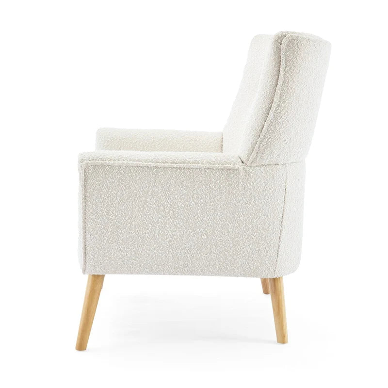 Poltrona moderna in tessuto felpato con gambe in legno